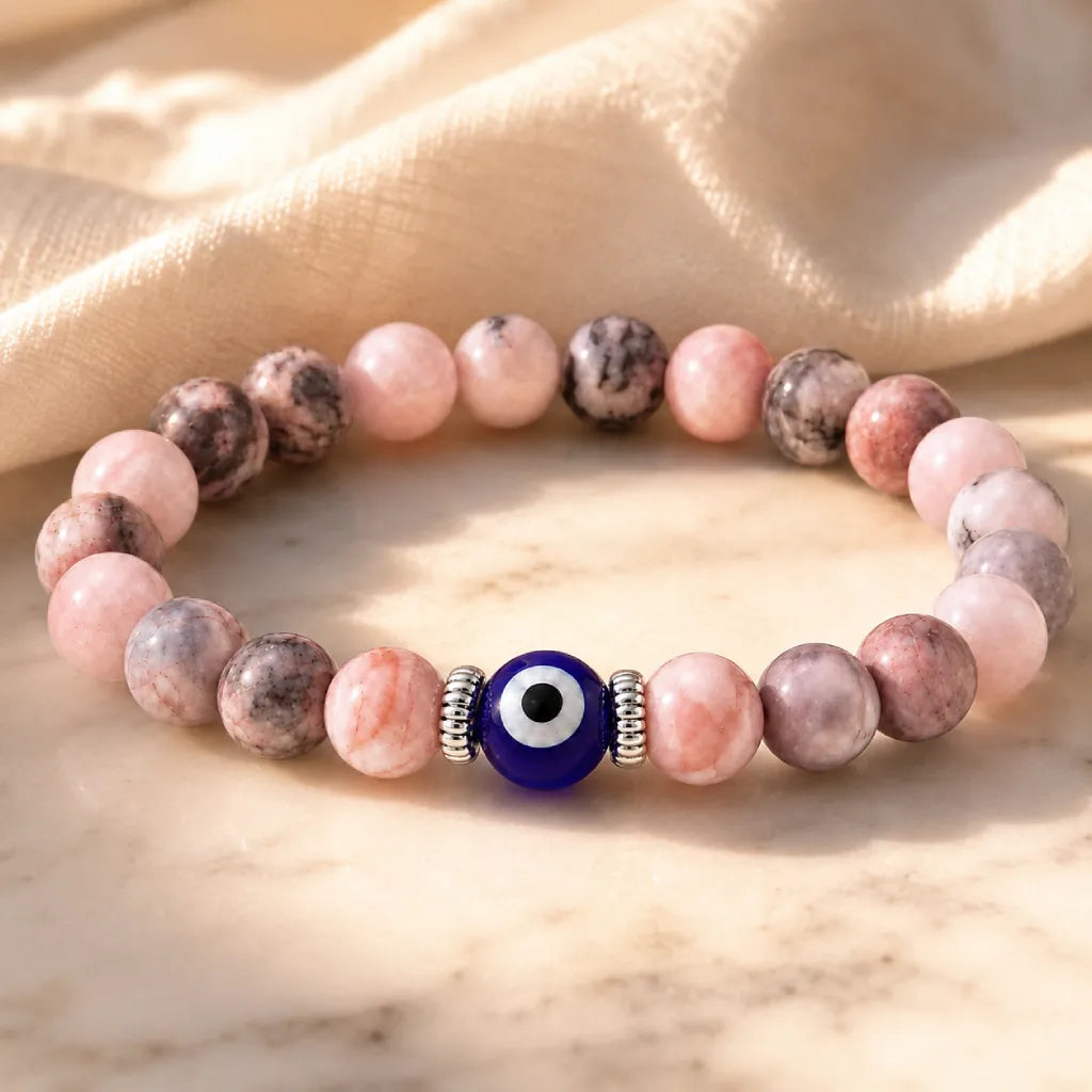 Agate evil eye healing bracelet with polished pink crystals, calming spiritual jewelry for mindful everyday wear