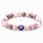 Agate evil eye crystal bracelet with pink gemstone beads, calming spiritual jewelry for balanced energy