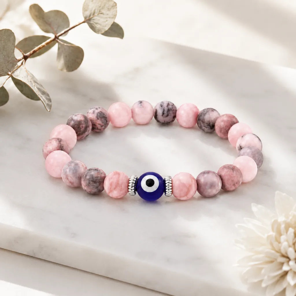 Agate evil eye bracelet displayed on luxury white gift box, elegant crystal jewelry for spiritual protection