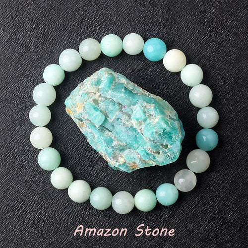 Beaded bracelet with amazonite stones on a dark surface