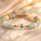 Amazonite crystal bracelet with pastel healing stones and warm golden lighting for soothing elegance.