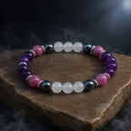 Amethyst healing bracelet with purple crystal and gemstone beads displayed for calming energy and style