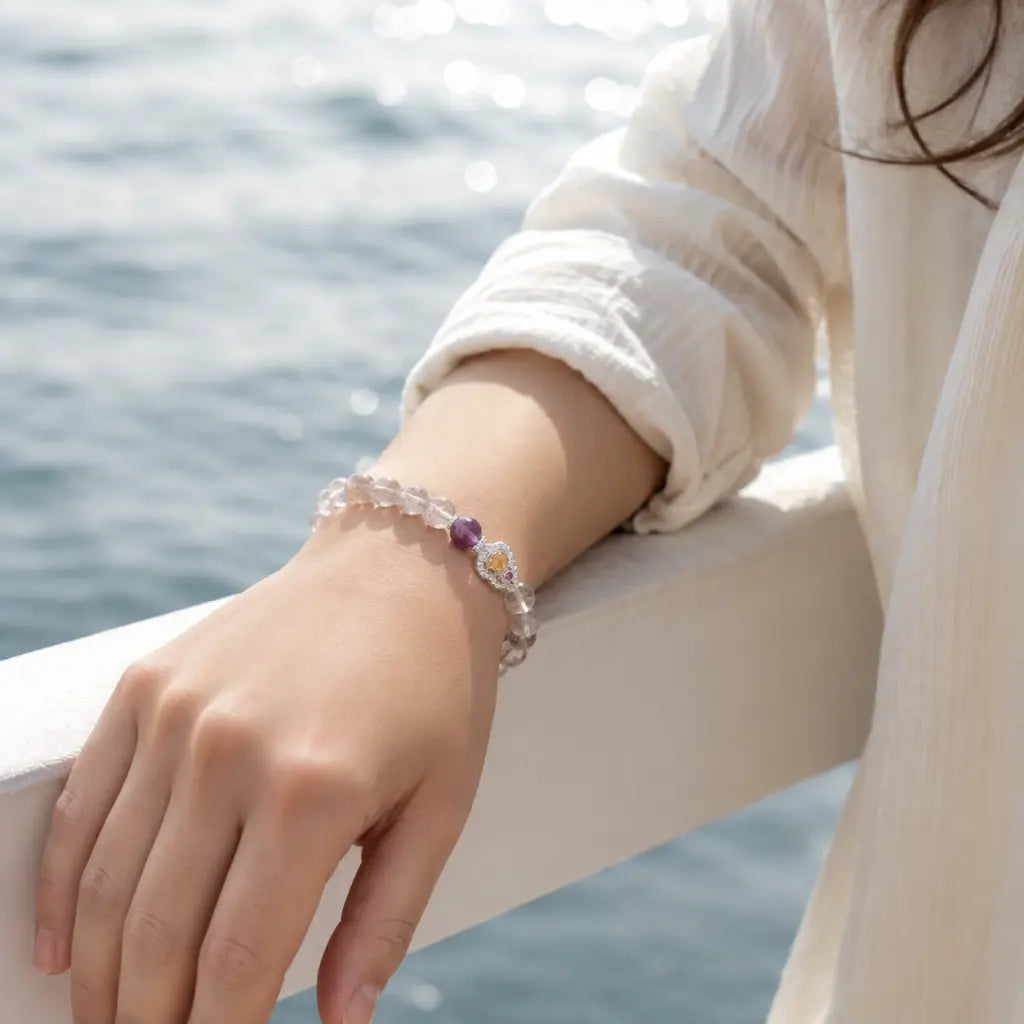 Amethyst crystal bracelet worn outdoors with healing gemstone beads creating peaceful everyday elegance