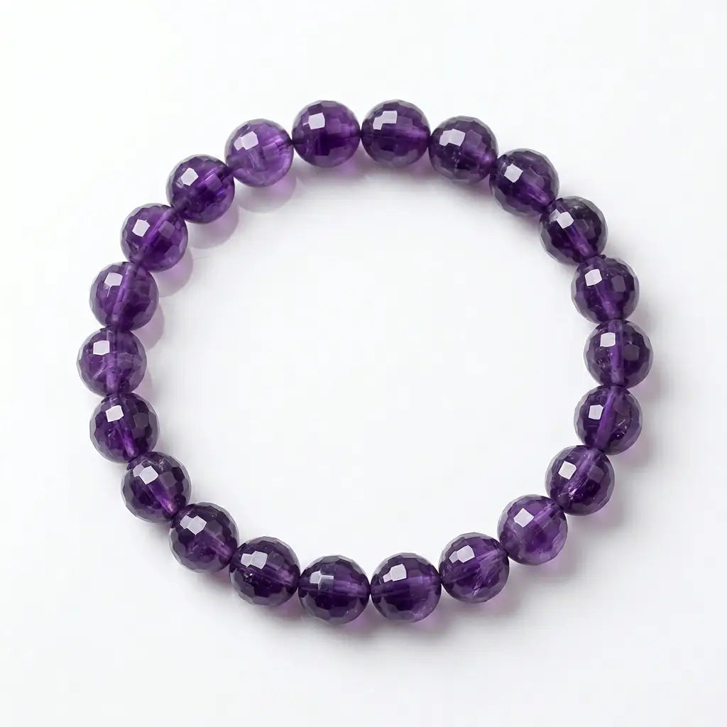 Amethyst bracelet featuring faceted deep purple beads in a clean circle, luxury crystal jewelry for balanced style