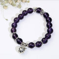 Violet Serenity amethyst bracelet with genuine natural purple beads in a polished stretch design, shown as simple gemstone jewelry for daily wear, mindful routines, and gift ideas.