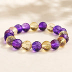 Amethyst citrine bracelet displayed with purple and gold faceted beads highlighting premium craftsmanship