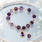 Amethyst crystal bracelet with mirrored silver display and gemstone beads for timeless elegance
