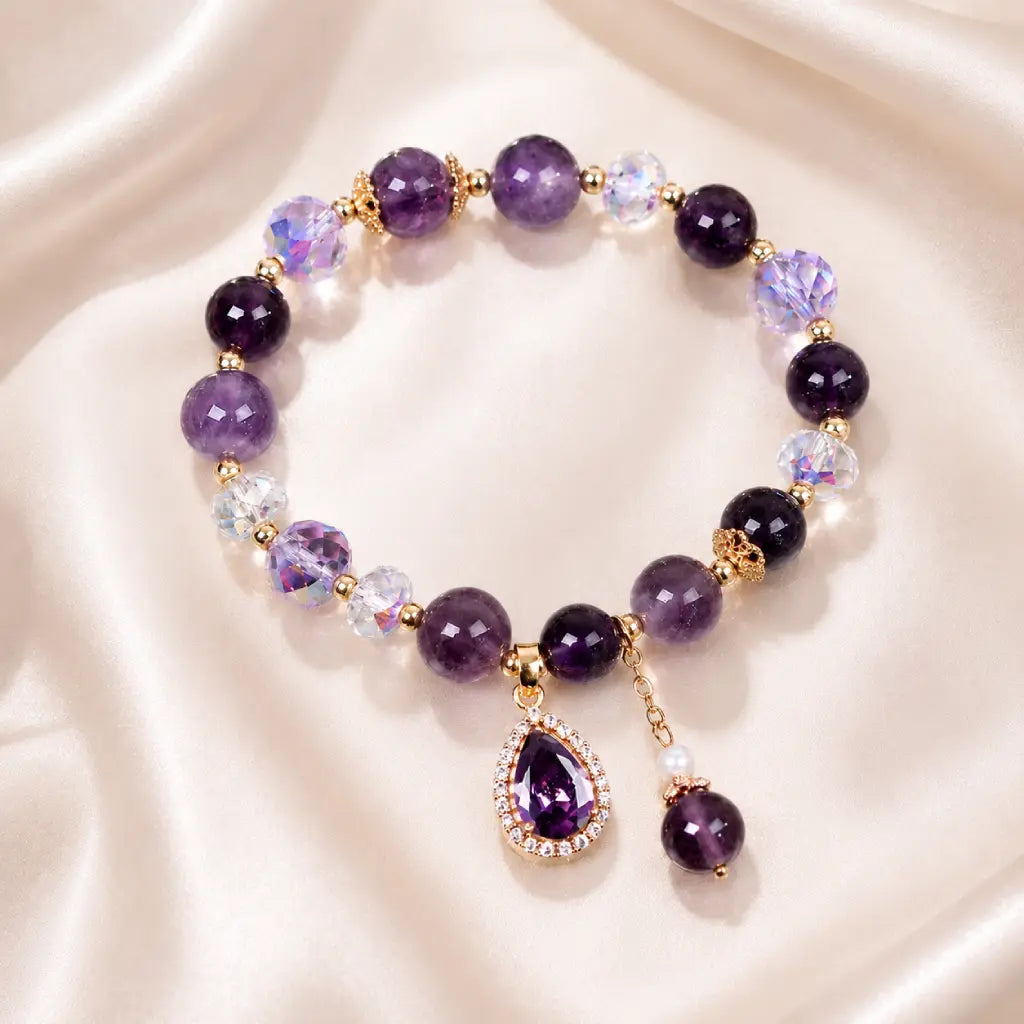 Amethyst crystal bracelet on soft silk fabric with sparkling gemstone beads for refined fashion appeal