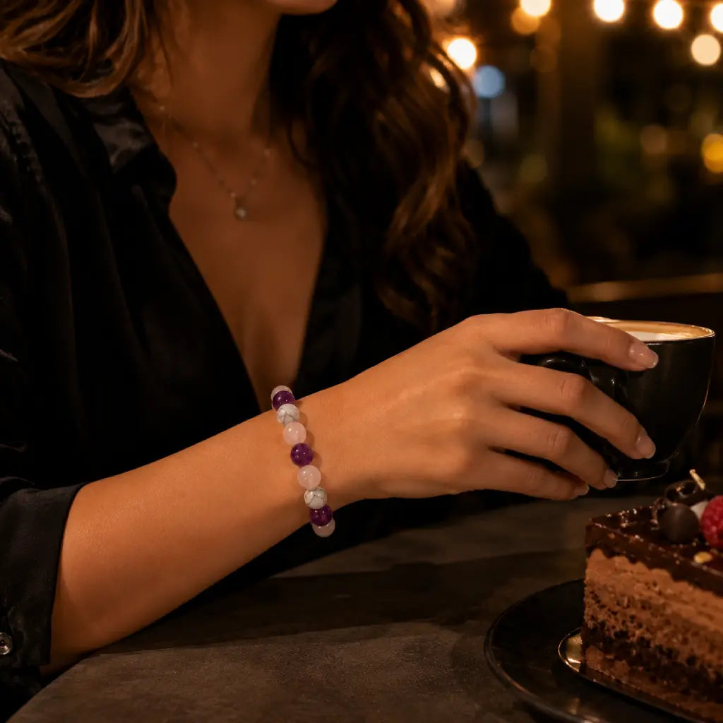 Amethyst-howlite-rose quartz bracelet worn during sleep for calming crystal energy and peaceful nightly relaxation.