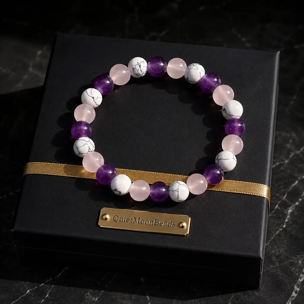 Amethyst-howlite-rose quartz bracelet displayed in premium gift packaging for elegant jewelry presentation.