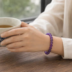 Amethyst jewelry paired with tea moments featuring purple gemstone bracelet for relaxing mindful comfort