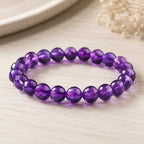 Amethyst jewelry showcasing purple crystal bead bracelet with spiritual gemstone appeal for calming beauty