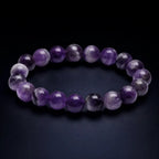Amethyst jewelry polished purple gemstone bracelet with glossy crystal beads designed for modern spiritual fashion lovers