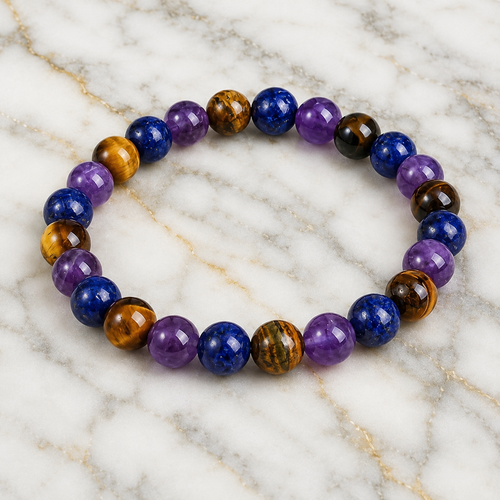 Amethyst Tiger's Eye Lapis Lazuli bracelet on marble with premium gemstone jewelry presentation