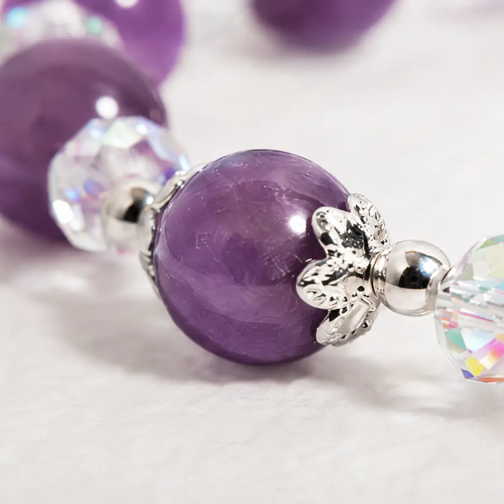 Amethyst white agate bracelet macro featuring a polished white agate heart surrounded by sparkling crystal beads and elegant silver accents.