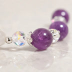 Amethyst white agate bracelet macro showcasing a genuine amethyst gemstone bead, faceted crystal spacer and elegant silver details for luxury jewelry.