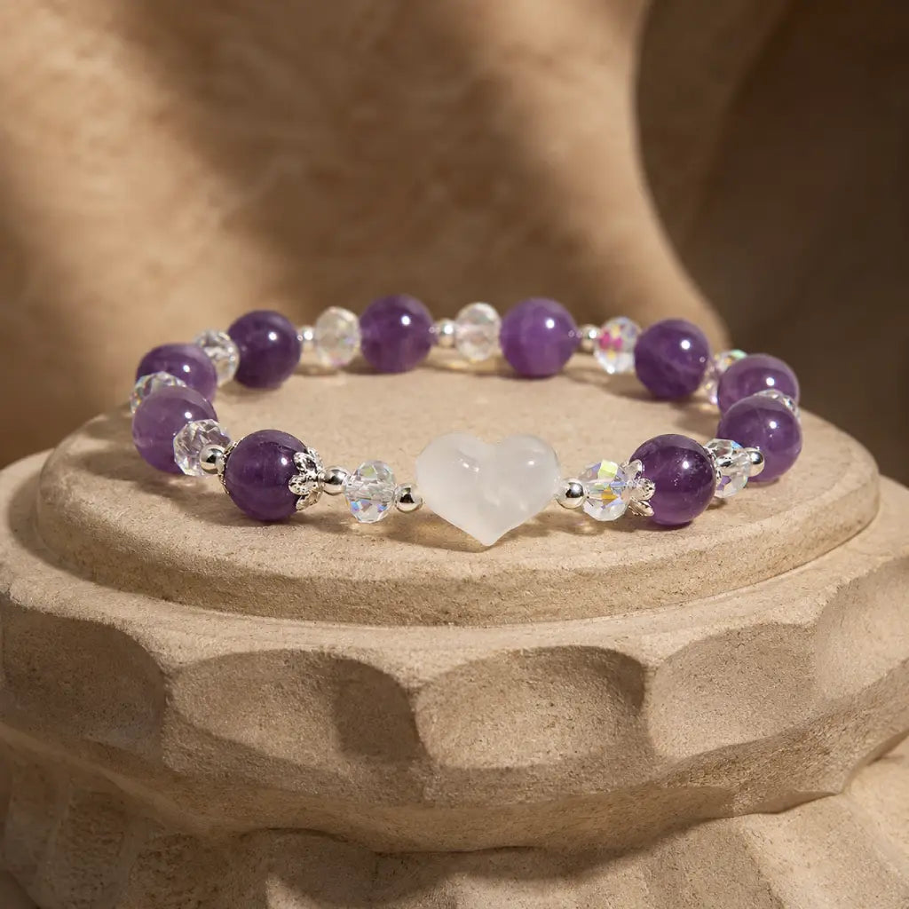 Amethyst white agate bracelet presented on a sculpted pedestal featuring natural gemstone beads and sparkling crystal details for luxury appeal.
