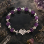 Amethyst white agate bracelet surrounded by crystals and mystical décor with natural gemstone beads for spiritual jewelry inspiration.