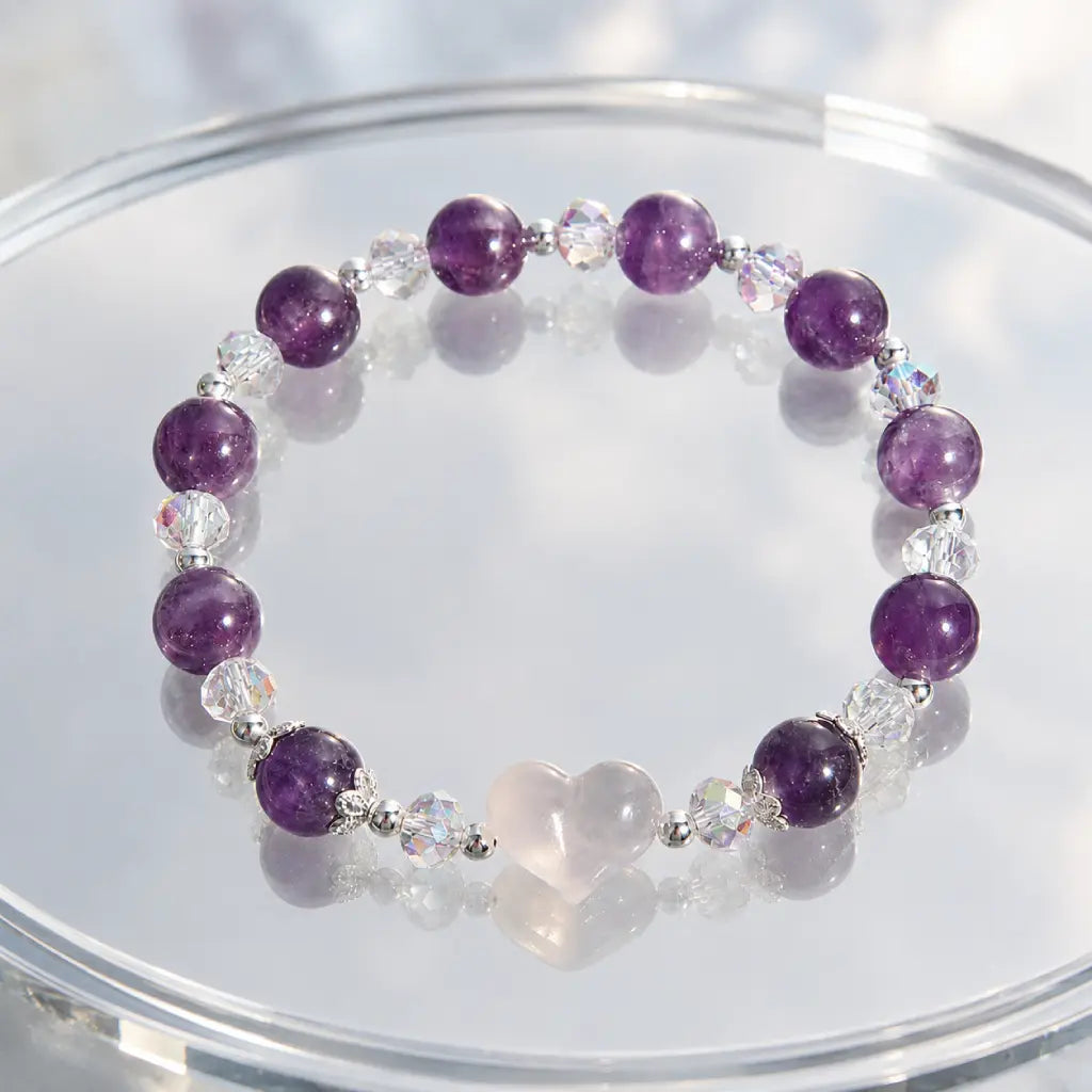 Amethyst white agate bracelet arranged on a clear display stand featuring natural purple gemstone beads and sparkling crystal accents.