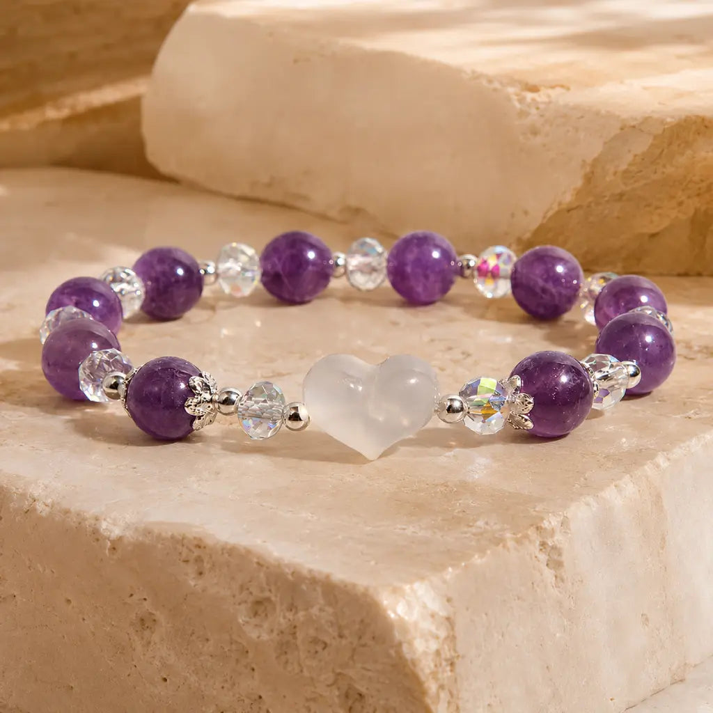 Amethyst white agate bracelet showcased on marble stone with genuine crystal beads and white agate heart designed for elegant gifting.