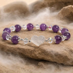 Amethyst white agate bracelet displayed on natural stone with polished gemstone beads and sparkling crystal accents for premium jewelry presentation.