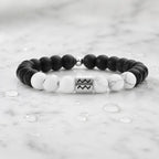 Aquarius zodiac bracelet on marble with water droplets, matte onyx, and howlite beads for fresh zodiac giftable style