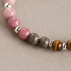 Aries crystal bracelet with tiger eye and pink healing stones designed for grounding confidence and balance