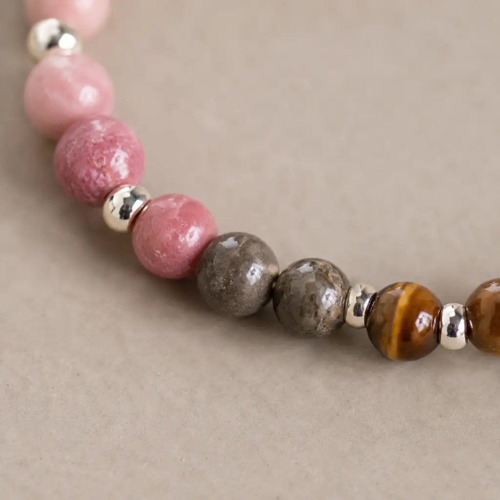 Aries crystal bracelet with tiger eye and pink healing stones designed for grounding confidence and balance
