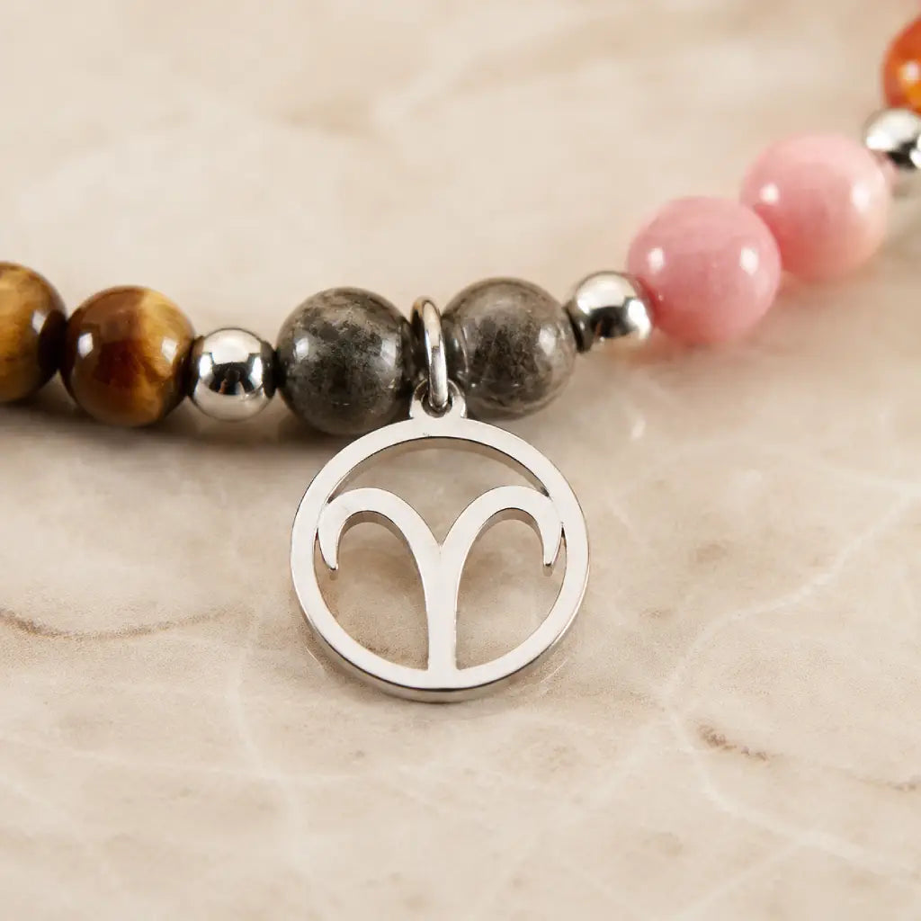 Aries crystal bracelet featuring silver zodiac charm and natural stones for stylish spiritual jewelry lovers
