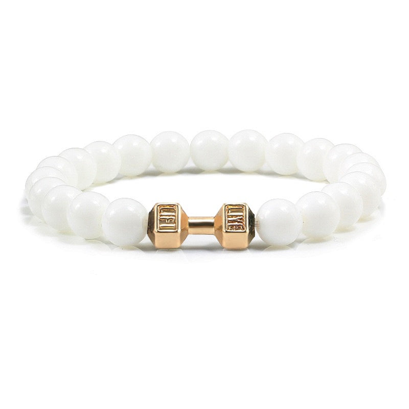 Barbell beaded bracelet in glossy white with gold-color connector, showing 8 mm round beads, a dumbbell-shaped connector, and a circular unisex strand on a bright white background.