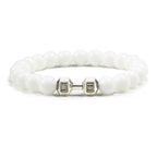 Barbell beaded bracelet in glossy white with silver-color connector, showing 8 mm round beads, a dumbbell-shaped connector, and a circular unisex strand on a bright white backdrop.