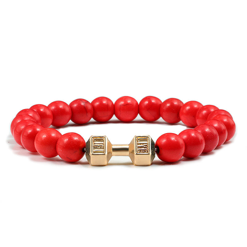 Barbell beaded bracelet in red with gold-color connector, showing 8 mm round beads, a dumbbell-shaped connector, and a circular unisex strand against a clean white product setting.