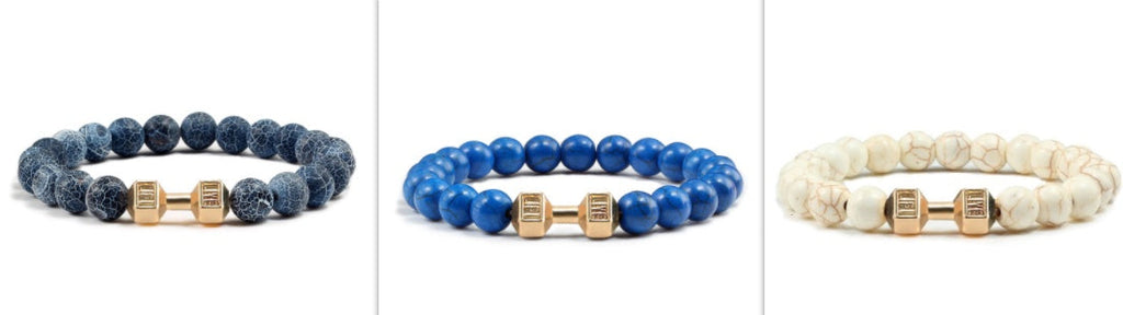 Barbell beaded bracelet in six-color coordinated Set selection, showing 8 mm round beads, a dumbbell-shaped connector, and a circular unisex strand on a clean white studio setting.