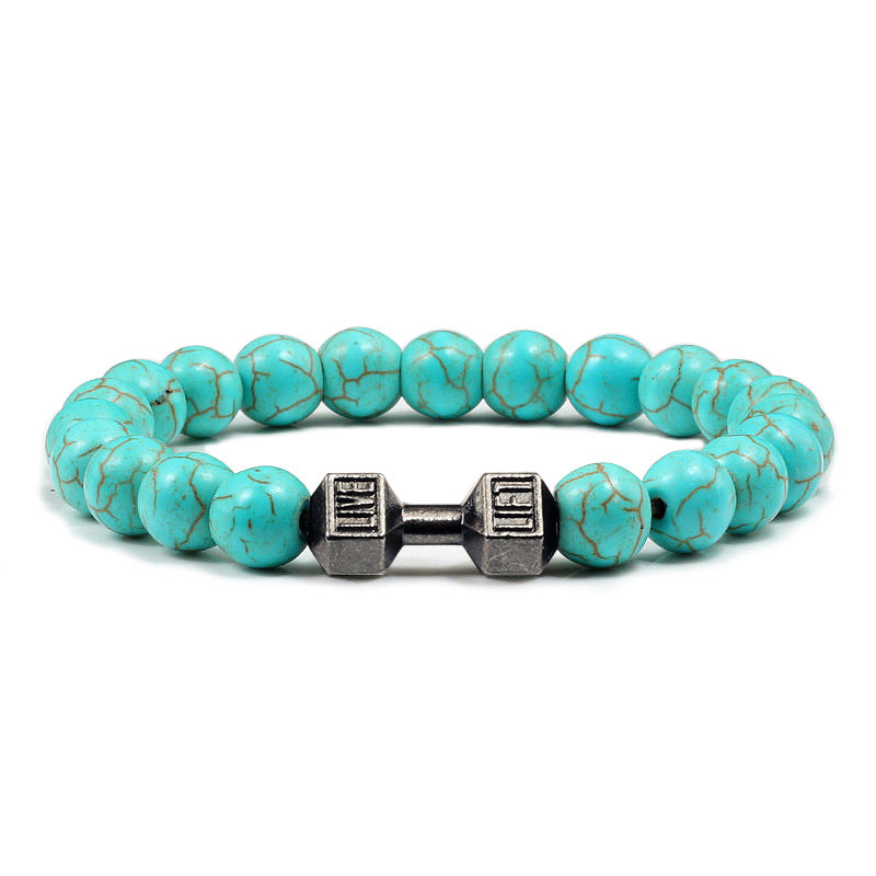 Barbell beaded bracelet in turquoise-color with gun-black connector, showing 8 mm round beads, a dumbbell-shaped connector, and a circular unisex strand on a bright white backdrop.
