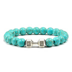 Barbell beaded bracelet in turquoise-color with silver-color connector, showing 8 mm round beads, a dumbbell-shaped connector, and a circular unisex strand in a clear product view.
