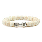 Barbell beaded bracelet in white porcelain with silver-color connector, showing 8 mm round beads, a dumbbell-shaped connector, and a circular unisex strand in a clear product view.