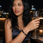 Black Obsidian labradorite crystal bracelet paired with elegant evening attire highlighting natural gemstone jewelry for refined modern fashion.