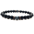 Black Obsidian labradorite beaded bracelet isolated on a white background featuring polished natural gemstone jewelry for online product shopping.