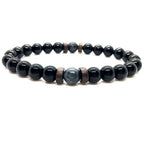 Black Obsidian labradorite beaded bracelet isolated on a white background featuring polished natural gemstone jewelry for online product shopping.