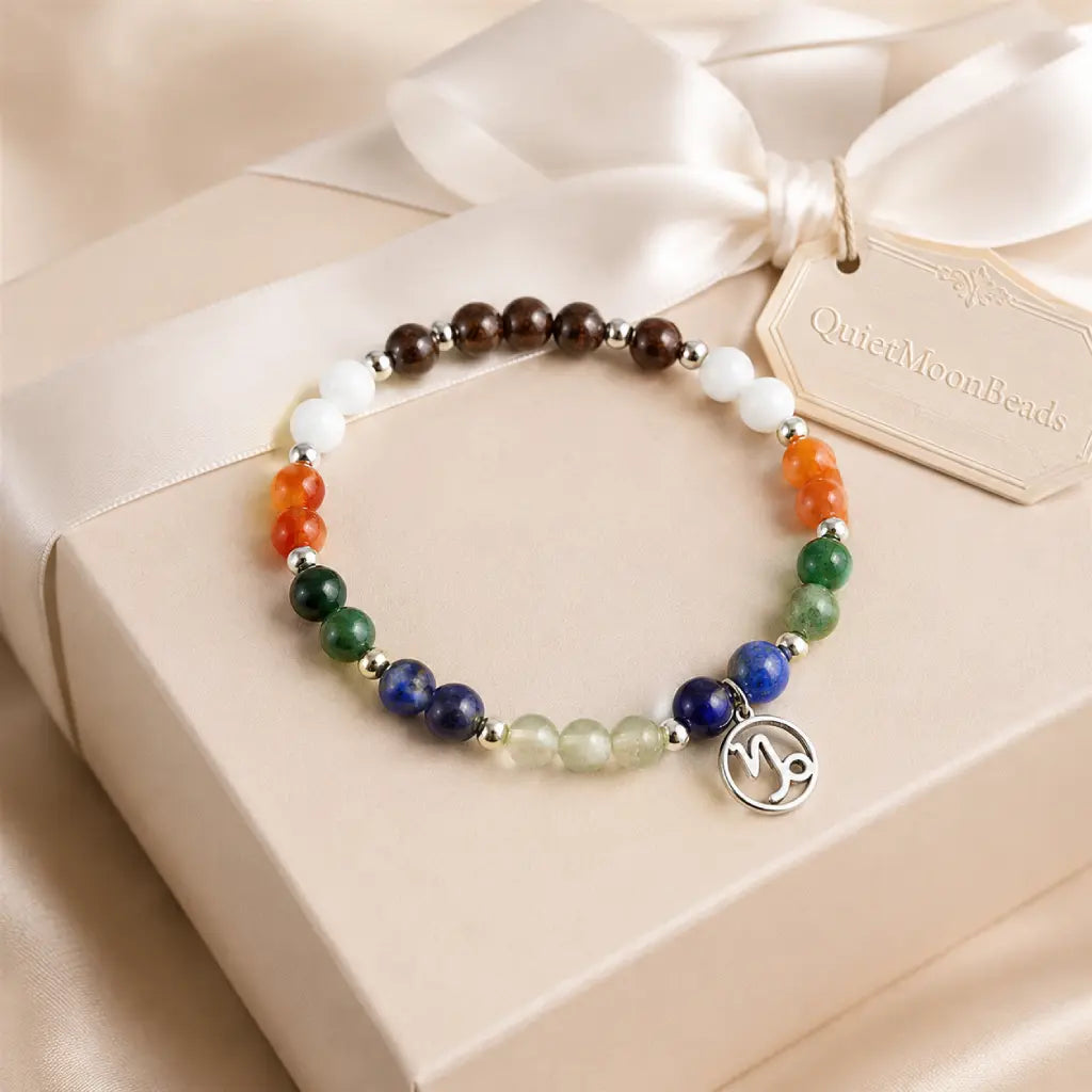 Capricorn zodiac gemstone bracelet displayed on a wrapped gift box featuring natural crystals for meaningful celebrations.