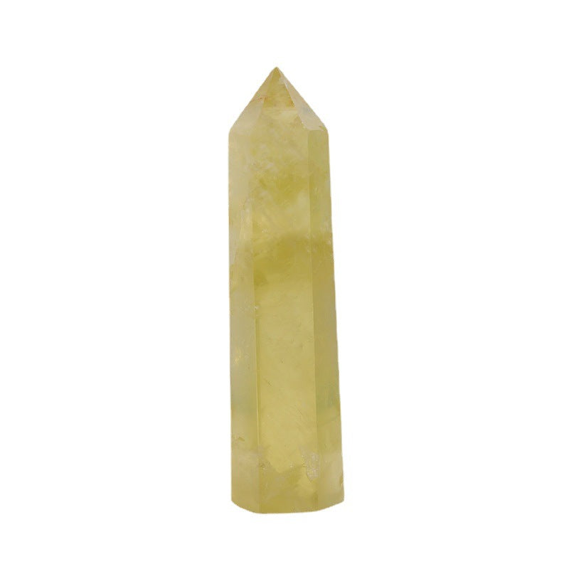 Citrine crystal tower shown alone, on a white backdrop, with pale yellow color, a flat base, six polished sides, a faceted point, and soft cloudy patterns inside the stone in view.