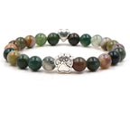 Dog paw stone bracelet with mixed multicolor beads, showing 8 mm round beads, a silver-color paw-print charm, a heart accent, and a circular unisex design for a clear product view.