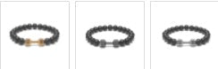 Dumbbell bracelet variant strip, showing gold-tone, silver-tone, and gun-black FIT LIFT centerpieces paired with matte black agate beads on a simple white background for reference.