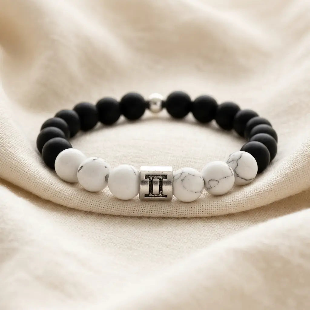 Gemini bracelet on soft linen with black onyx, white howlite beads, and silver charm for airy zodiac style gift