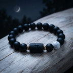 Gemini Zodiac Bracelet with black matte beads under moonlight, astrology jewelry piece for calm energy and stylish wear