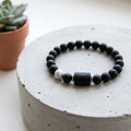 Gemini Zodiac Bracelet on round stone with black beads and marble accent, luxury astrology jewelry for refined minimal style and gifting