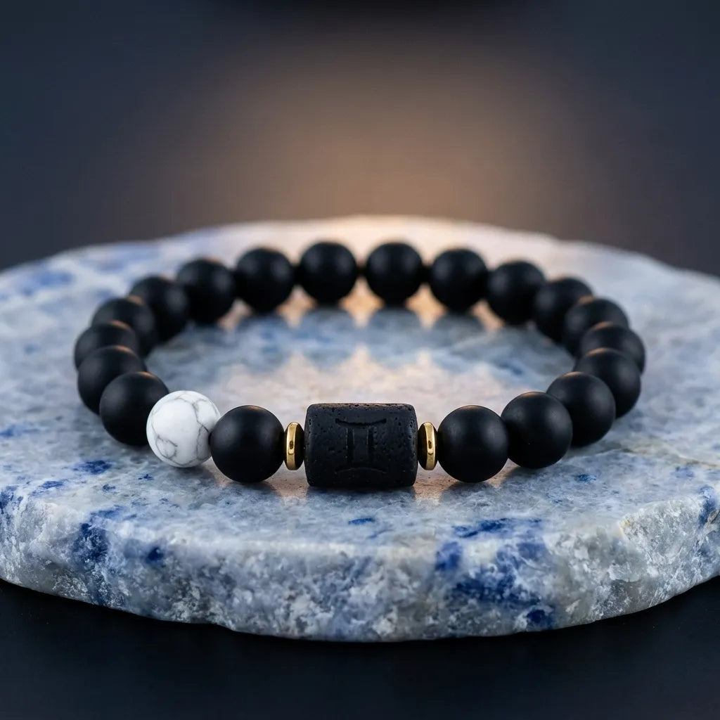 Gemini Zodiac Bracelet on stone platform with black beads and marble accent, elegant astrology jewelry for daily style and balance