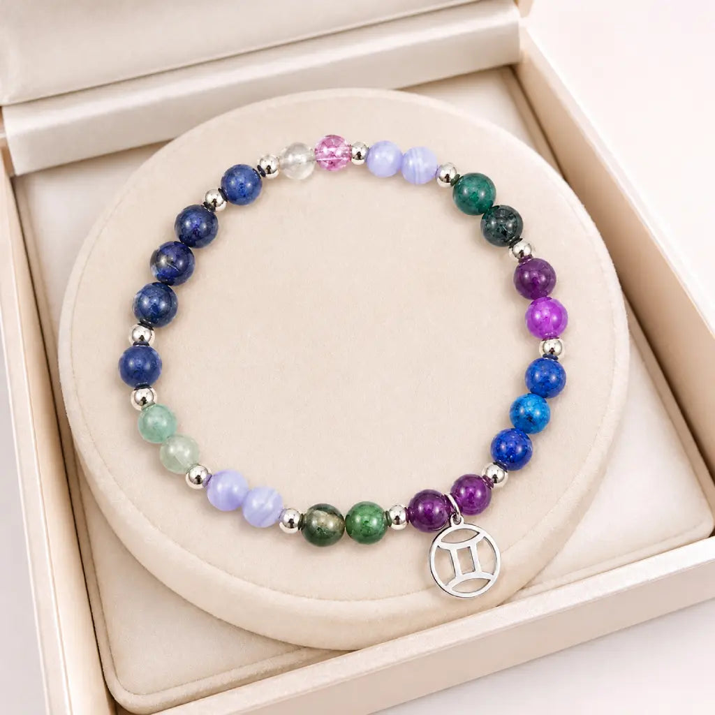 Gemini zodiac crystal bracelet displayed in luxury gift box. Top-rated birthstone jewelry with zodiac charm. Ideal birthday present for Gemini women 2026.