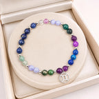 Gemini zodiac crystal bracelet displayed in luxury gift box. Top-rated birthstone jewelry with zodiac charm. Ideal birthday present for Gemini women 2026.