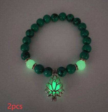 Glow in the dark lotus bracelet two-piece green stone set with green glow, with 8 mm real-stone beads, elastic fit, a silver-color lotus, and light-charged accents for daily style.